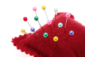 red pin cushion