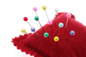 red pin cushion