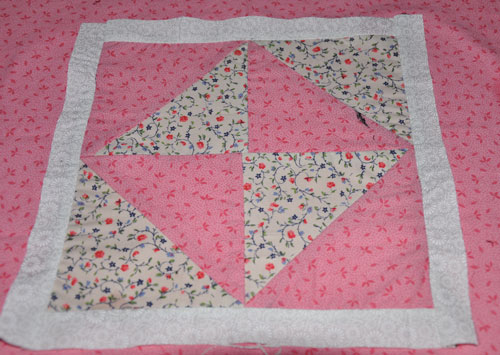 sewn triangles into squares
