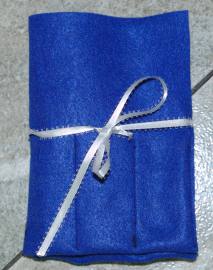 felt organizer tied with ribbon